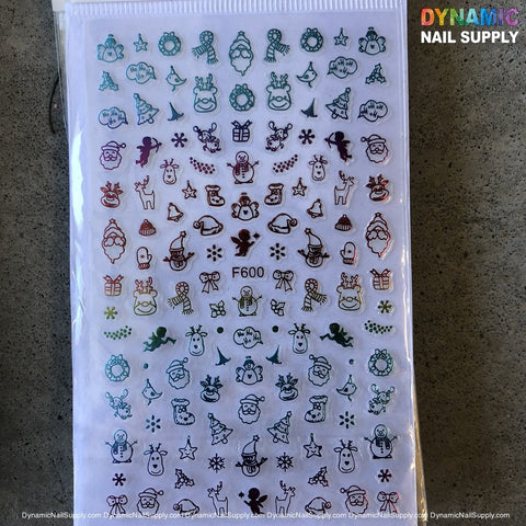 The NAIL ART STICKERS - CHRISTMAS NAILS STICKER - F600 from Dynamic Nail Supply features festive designs such as snowflakes, Santa faces, reindeer, wreaths, candy canes, and bells in vibrant colors. The Dynamic Nail Supply logo is elegantly placed in the top right corner.