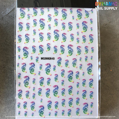 A sheet of eye-catching nail art stickers showcases dragon designs in red, blue, and green patterns. Each dragon maintains a uniform orientation for a cohesive appearance. The sheet, identified as MG200828-03, prominently features the Dynamic Nail Supply brand at the top. Ideal for fans of unique Dragon Stickers!