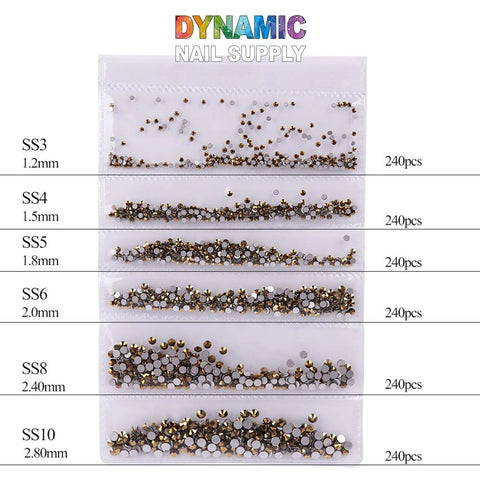 Image of the QH0250 Nail Art Rhinestones 3D Gems Decorations package from Dynamic Nail Supply featuring metallic nail art studs and dazzling rhinestones. The package contains sizes SS3 to SS10, with 240 pieces each neatly organized in individual compartments, making it ideal for adding intricate 3D gems decorations to your designs.
