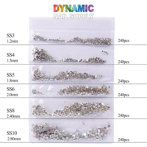 Discover the Dynamic Nail Supply's QH0250 Nail Art Rhinestones 3D Gems Decorations, an excellent choice for nail art. These rhinestones come in six distinct sizes ranging from SS3 (1.2mm) to SS10 (2.8mm). Each size includes 240 pieces neatly packaged in clear bags with a silver reflective surface, making them perfect for adding sparkle to your creations.