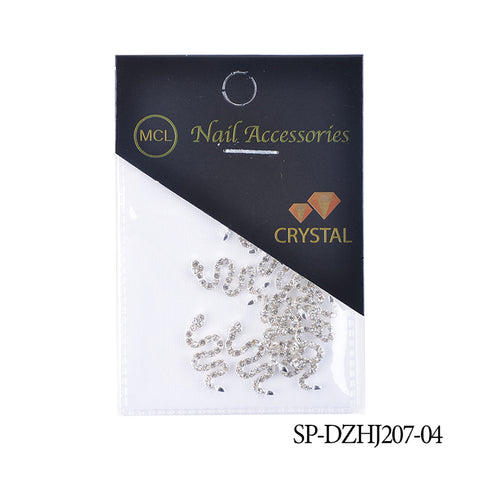 The transparent plastic packaging of Dynamic Nail Supply, labeled CRYSTAL, showcases silver, snake-shaped nail embellishments that are ideal for detailed nail art design. The item code SP-DZHJ207-04 is printed in black. The top features a stylish black design with elegant gold and white lettering from Dynamic Nail Supply.