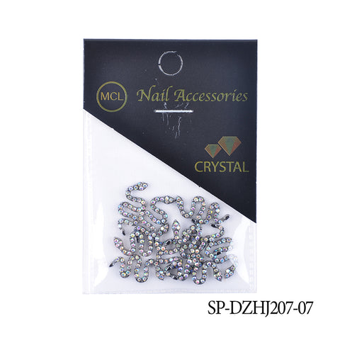 A packet of Dynamic Nail Supply nail accessories includes a set of 10 sparkling snake-shaped charms, ideal for any nail art design. The black and white packaging prominently displays the Dynamic Nail Supply brand logo in gold, with the product code SP-DZHJ207-07 elegantly placed in the bottom right corner.