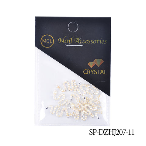 The image showcases a package from Dynamic Nail Supply, labeled as 10 pcs of Snake Shape Charms for Nails Art Design (Smaller version). Inside are decorative, wavy nail embellishments adorned with small crystals, perfect for enhancing any nail art design. The packaging includes a semicircular cutout for hanging and features the product code SP-DZHJ207-11 in the lower right corner.