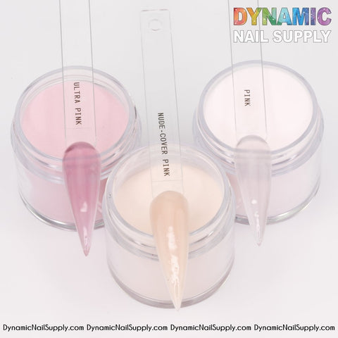 Three small jars of Nude, Ultra Pink, and Pink acrylic powder from Dynamic Nail Supply are displayed on a white background. Each jar includes a clear nail swatch demonstrating the color, perfect for dipping and sculpting. Enjoy long-lasting nails with Dynamic Nail Supply's superior quality, with their logo prominently featured at the top right.