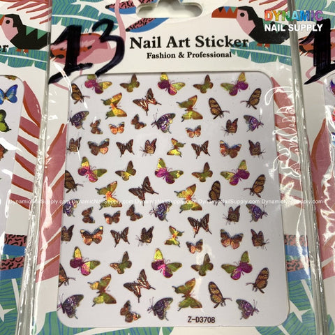 A package of butterfly stickers for nails art design features a vibrant array of colorful designs ideal for elevating your nail art. These stickers come in shades of orange, purple, and pink with metallic accents and are labeled as Nail Art Sticker Fashion & Professional by Dynamic Nail Supply. The package is identified by code Z-D3708.