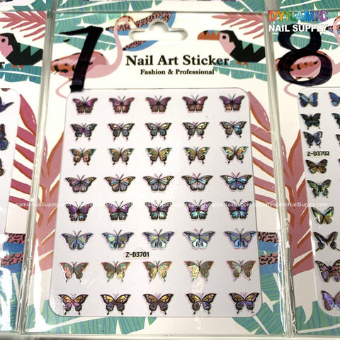 A sheet of butterfly stickers includes a range of small, colorful butterflies ideal for creating unique nail art designs. Bearing the label "Nail Art Sticker, Fashion & Professional," the packaging features a backdrop of tropical birds and leaves, with the product code Z-D3701 prominently displayed. The product is named "Butterfly stickers for nails art design" and is offered by Dynamic Nail Supply.