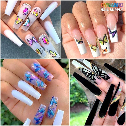 A collage of designer nail designs featuring mesmerizing butterflies: The top left displays long white nails enhanced with colorful butterfly stickers and gems. On the top right, nude nails are adorned with yellow, black, and green butterfly water decals from Dynamic Nail Supply's 24 sheets pack. The bottom left showcases light blue nails embellished with intricate 3D butterfly art, while the bottom right impresses with black nails flaunting a large butterfly decal.