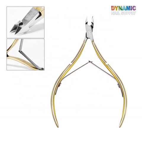 Introducing the D501 Professional Stainless Steel Cuticle Nipper by Dynamic Nail Supply, a sleek nail clipper featuring silver and gold hues, curved handles, and sharp blades designed for precision. Perfect for your manicure tools collection, this tool is shown open with a detailed view of its cutting edge on the top left. The brand logo "Dynamic Nail Supply" is displayed in vibrant colors at the top right.