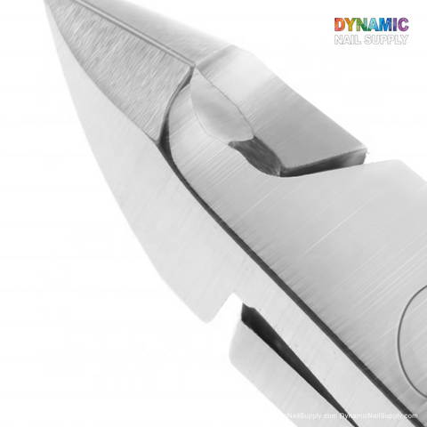 Close-up of the D501 Professional Stainless Steel Cuticle Nipper, an ideal addition to any manicure tools collection, featuring sharp, angled blades. The image emphasizes the precision and sleek design of this stainless steel accessory. In the upper right corner, the brand name Dynamic Nail Supply is displayed in colorful letters.