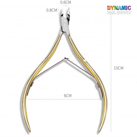 Introducing the D501 Professional Stainless Steel Cuticle Nipper by Dynamic Nail Supply—a perfect addition to your manicure tools collection. Featuring a sleek metallic finish, this nail clipper measures 15 cm in length, with blades that are 0.8 cm wide and 0.6 cm thick. The handles open up to 6 cm apart, proudly displaying the Dynamic Nail Supply logo in the top right corner.