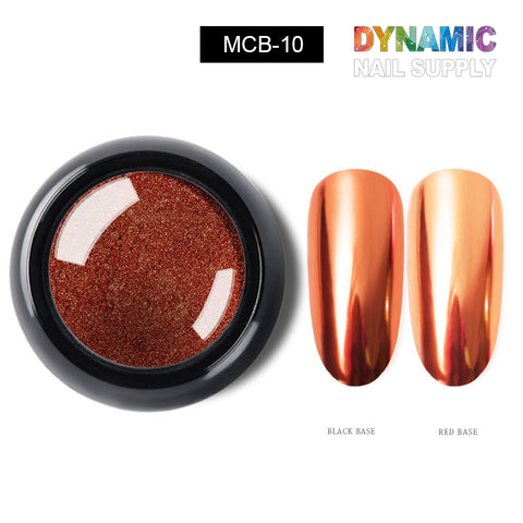 A round container of Chrome Effect Nails from Dynamic Nail Supply, identified as MCB-10, holds a dazzling copper-red metallic chrome pigment. Two sample nails illustrate its effect: when applied over a black base, it presents as a rich deep copper, while over a red base, it offers an attention-grabbing vibrant metallic orange with a striking chrome finish.