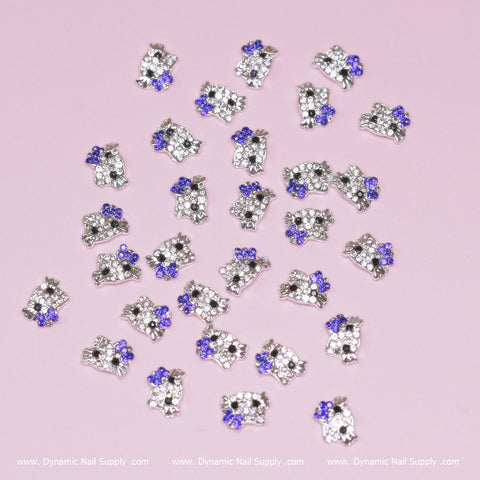 A scattering of royal blue Hello Kitty nail charms (30pcs, metal zircon alloy) for dazzling nail designs.