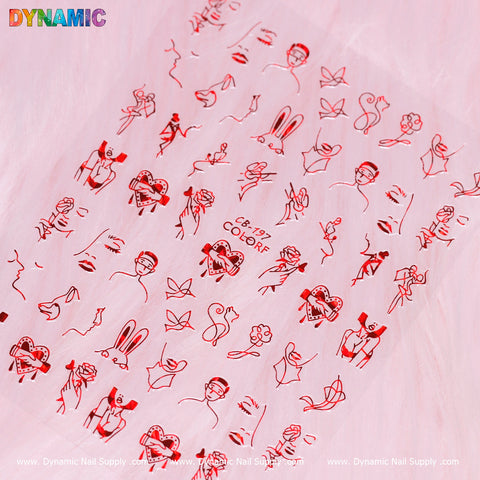 The hand writing art (red) sheet, CB 197, from Dynamic Nail Supply is adorned with pink nail art stickers featuring red line drawings. The designs include cartoon-like figures, hearts, rabbits, stars, and abstract shapes. "DYNAMIC" is prominently displayed in colorful letters at the top left corner, while "Dynamic Nail Supply" is artistically repeated similar to handwriting across the bottom of the image.