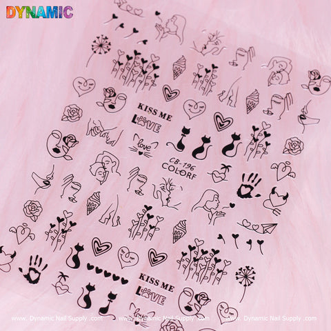 A sheet of the Dynamic Nail Supply hand writing art (black) (CB 196) nail stickers is displayed on a pink background, featuring diverse designs such as roses, hands, and phrases like "Kiss Me" and "Love." The top of the sheet displays the word "DYNAMIC" in colorful letters. For more styles of hand writing art, visit www.DynamicNailSupply.com.