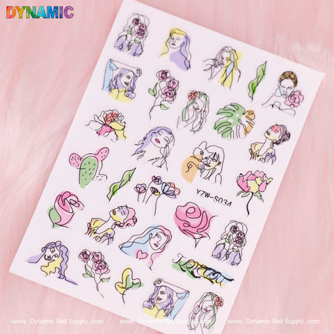 A sheet of vibrant nail stickers, named Hand Writing (YZW S034), rests on a pink background. The playful designs include women, flowers, plants, and abstract patterns in pastel hues, exuding artistic charm. The Dynamic Nail Supply brand name adorns the top left corner, enhancing the product's visual appeal.