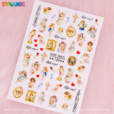 The Religious, Angel, Cupid Sticker (188) from Dynamic Nail Supply showcases a vintage-style design titled Angel Whisper. It features cherubs, hearts, and roses with the text "Little angel" on a soft pink background. Various religious motifs of angels in different poses enhance the collection's charm. The Dynamic Nail Supply branding is prominently displayed at the bottom of this Cupid-themed sticker set.