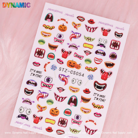Introducing the Monstrous Mouth Sticker collection from Dynamic Nail Supply, model STZ-CS054. This delightful set of Halloween-themed nail art stickers is set on a pink background and features cartoon mouths, fangs, tongues, and jack-o-lanterns in vibrant colors. Some stickers even include speech bubbles saying, "It's okay! I'm fine!
