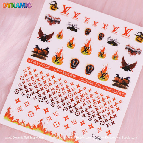 The Luxury Halloween Sticker (T-590) by Dynamic Nail Supply showcases a luxurious assortment of Halloween-themed nail designs, including Louis Vuitton logos, pumpkins, skulls, flames, bats, and witch hats. These stunning stickers are meticulously arranged in rows with vibrant colors and intricate details set against a pink background.