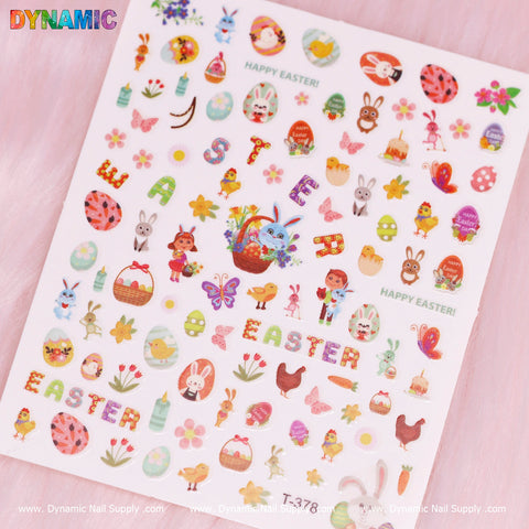 The Easter Sticker (T-378) from Dynamic Nail Supply features vibrant and festive designs, including eggs, bunnies, chicks, flowers, and bold 'Easter' letters. Some stickers display 'Happy Easter.' It's ideal for creative nail art on a pink background.