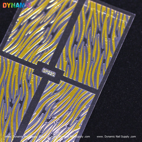 A close-up of the Animal Pattern Nail Sticker (SP220) is set against a gold background with an animal pattern accent. The stickers feature silver flames with metallic lines, divided into sections. In the top left corner, "DYNAMIC" is displayed in colorful letters, while Dynamic Nail Supply's name and website link are located at the bottom edge.