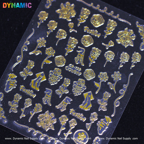 A chic black sheet features gold nail art stickers adorned with rose motifs, high heels, flowers, and the words "Fashion" and "Luxury." The bold EX-708 COLORS commands the center, while Dynamic Nail Supply is elegantly inscribed along the bottom edge in a style reminiscent of Hand Writing Art.