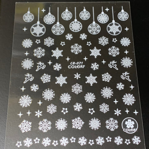 A 20-piece set of Christmas nail stickers from Dynamic Nail Supply, priced at $30, features a black background adorned with snowflakes, baubles, reindeer, and stars. The top row highlights hanging baubles. The product code CB-071 and brand name COLORF are prominently displayed in this festive collection.