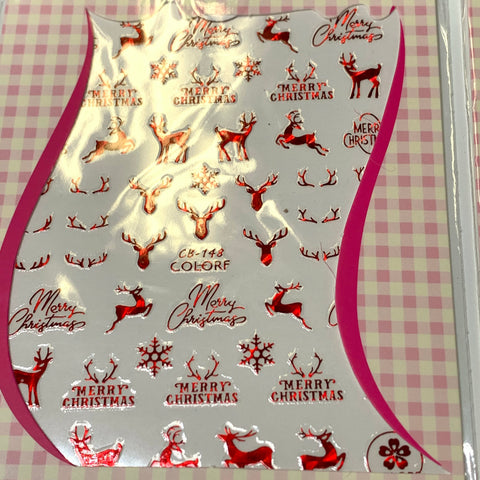 A set of Dynamic Nail Supply's bundle of 20 Christmas nail stickers, priced at $30, is showcased on a pink and white checkered background. The stickers feature red designs such as reindeer, snowflakes, and the phrase "Merry Christmas" in cursive. The sheet is labeled CB-148 COLORF at the bottom.