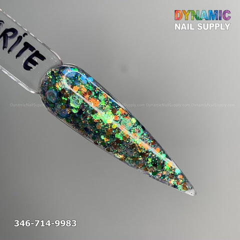 A sample of nail polish labeled Labradorite #329 from Dynamic Nail Supply showcases chip-resistant multicolored glitter in green, blue, orange, and silver on a pointed acrylic nail tip. The background is light gray with the Dynamic Nail Supply logo in the top right corner and a contact number in the bottom left.