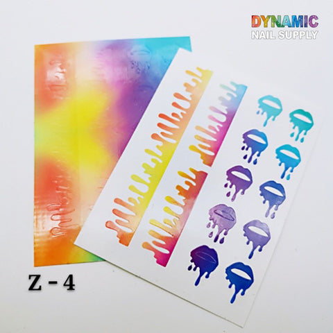 Displayed are two sheets of nail art stickers. One showcases a colorful gradient with yellow, pink, and purple hues, while the other features lip stickers with dripping patterns in those vibrant colors. Ideal for enhancing your nail art collection, the Dynamic Nail Supply Hot Designs - Lips Sticker for Nails Art Decoration is visible in each corner.