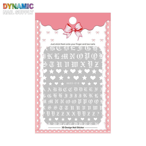 A package of Roman Alphabet Letters Stickers for Nail Art Design & Nails Decoration by Dynamic Nail Supply, featuring gothic-style alphabet letters and small shapes like stars and hearts. The packaging is adorned with pink lace and a bow at the top, with the instructions to simply stick them onto your fingernails and toenails.