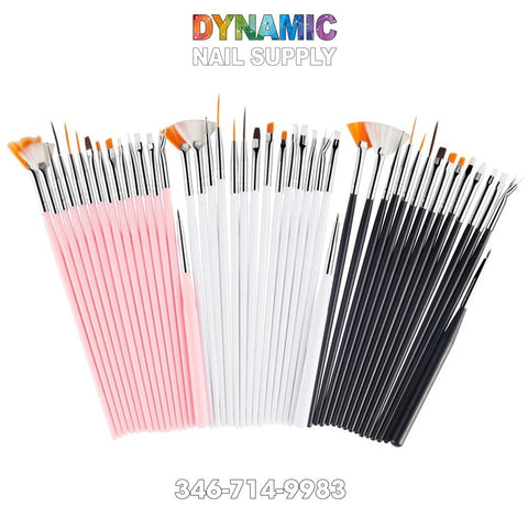 An arrangement of nail art brushes and dotting pens featuring pink, white, and black handles set in rows. This set, from the Dynamic Nail Supply brand, includes an array of shapes and sizes such as fan brushes, liner painting tools, and detail brushes. Against a white background is the text "Dynamic Nail Supply" in vibrant colors with a contact number below.