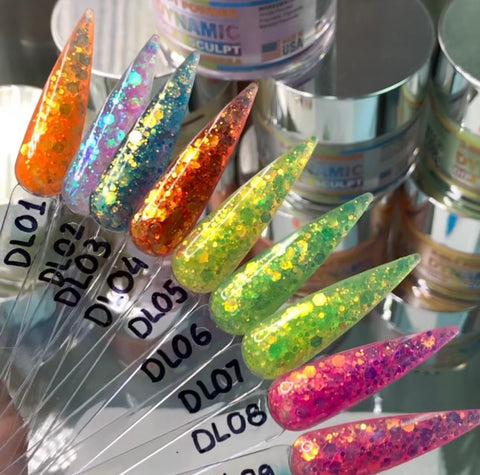 A striking arrangement of nine nail polish swatches, labeled DL01 to DL09, highlights the vibrant New Neon Glitter Acrylic Collection for the Summer 2021 by Dynamic Nail Supply. This range spans from orange to pink, featuring eye-catching neon glitter acrylic and holographic effects. In the backdrop, glossy containers with text assure long-lasting wear, making it an ideal choice for fans of 2-in-1 Acrylic & Dipping Powder.