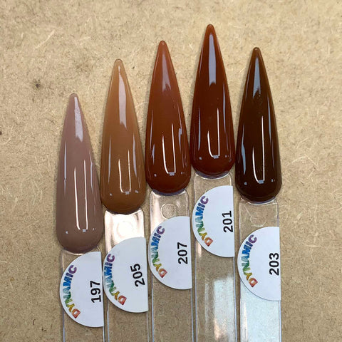 The 2024 New Fall Colors Acrylic Collection (Part 1) by Dynamic Nail Supply features five nail polish swatches with a glossy finish, ideal for nail art enthusiasts. These chip-resistant shades range from a light taupe (197) to medium brown (205), warm tan (207), rich brown (201), and dark brown (203).